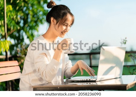 portrait of beautiful asian woman, early morning,
 Royalty-Free Stock Photo #2058236090
