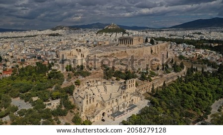 Aerial drone photo of iconic Acropolis hill and the Parthenon and Unesco World Heritage Masterpiece of ancient times, Athens historic centre, Attica, Greece