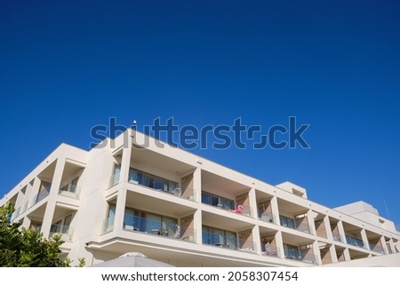 Luxury flats for sale. Architectural background of the city. Large housing block. New construction of modern style neighbourhood. Real estate market in Europe.