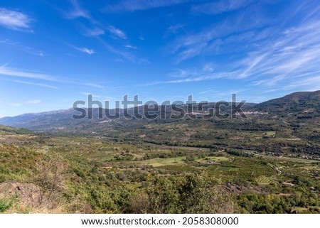 Landscape view of Valle del Jerte, Extremadura, Spain. Urban rural life concept. Horizontal photo