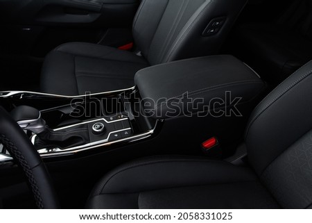 Armrest in the car for driver. Car armrest Royalty-Free Stock Photo #2058331025