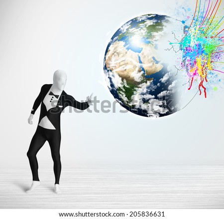 Funny man in body suit looking at colorful splatter 3d earth, Elements of this image furnished by NASA