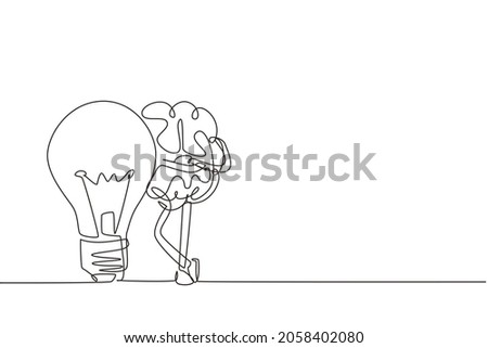 Single one line drawing brain leaning on the light bulb. Symbol of new idea that came to mind. Brain character inspired by the idea soars up. Continuous line draw design graphic vector illustration