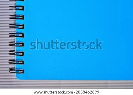 Blue paper note with empty blank space for text or work