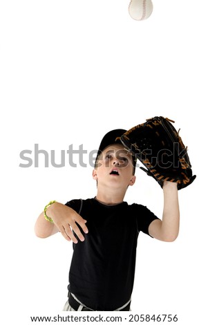 baseball player focused on catching the ball