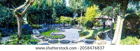 A Japanese style Zen garden to being harmony and relaxation to all that pass through it.