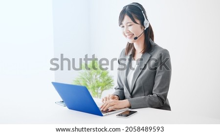 Image of customer support operator Royalty-Free Stock Photo #2058489593