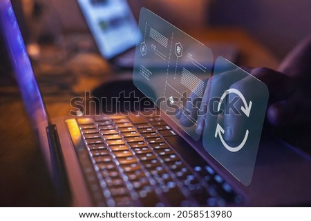 update concept, software upgrade icon on virtual screen Royalty-Free Stock Photo #2058513980