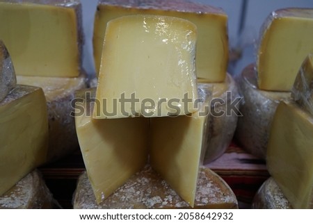 Cheddar cheese produced by keeping it in a dark room.