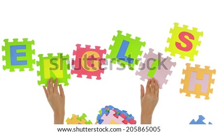 Hands forming word "Education" with jigsaw puzzle pieces isolated 