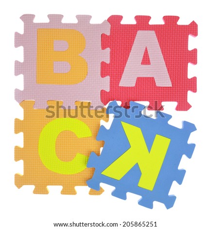 Word "Back"  jigsaw puzzle pieces isolated on white