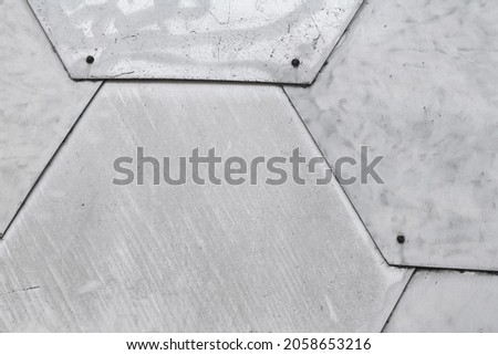Photo texture of metal armor plates surface.