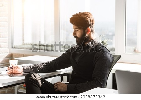 young business man work in modern office on computer