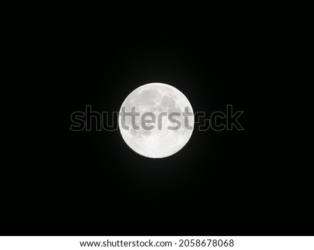 This picture shows the moon on a clear night.