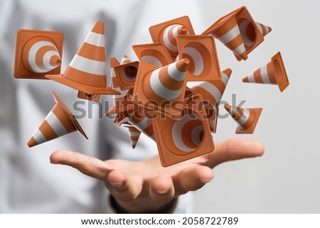 A person presenting a virtual 3D rendered projection of traffic cones representing website construction