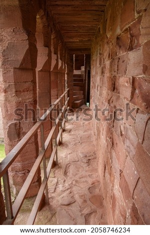 A vertical shot of a narrow passage inside the famous historic ruined Arbroath Abbey in Scotland