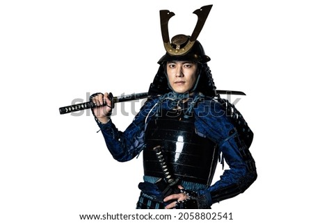 Japanese samurai wielding a sword. Japanese traditional warrior. Royalty-Free Stock Photo #2058802541