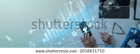 Healthcare and Medical business vitual graph data and growth with Medical examination and doctor analyzing medical report network connection on smartphone.  Royalty-Free Stock Photo #2058831710