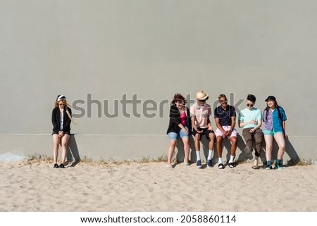 Social exclusion, teenagers bullying a girl Royalty-Free Stock Photo #2058860114