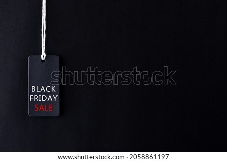 Black Friday concept. Black Friday sale tag on black background with copy space for text or advertiser.