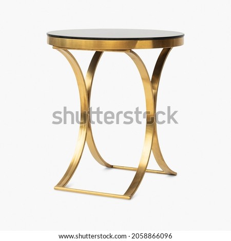 Fancy side table in brass and marble Royalty-Free Stock Photo #2058866096