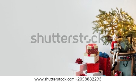 Christmas presents by a wooden chair blog banner post