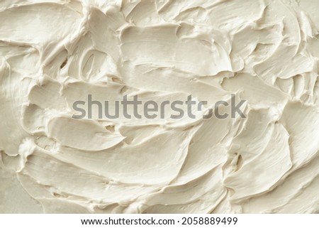 Icing frosting texture background close-up Royalty-Free Stock Photo #2058889499