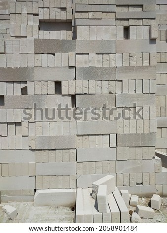 Pile of concrete bricks for construction materials. Use for material for 3D rendering and collection of construction background.