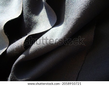 Brown woolen fabric, textile. Fabric texture.