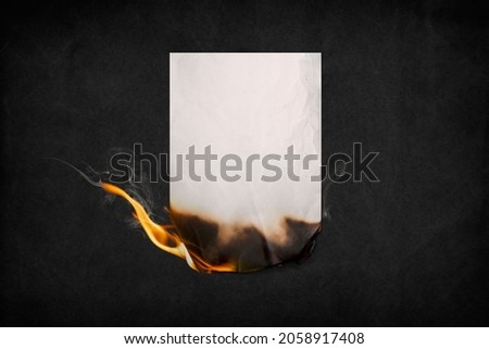 Burning poster, fire blank paper high resolution image Royalty-Free Stock Photo #2058917408