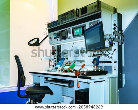 Radio-electronic laboratory. The engineer's desktop. Professional automatic machinery. Equipment, appliances, devices. Engineering developments and research.