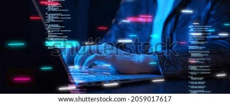 Business man using computer hand close up futuristic cyber space and decentralized finance coding background, business data analytics programming online network metaverse digital world technology  Royalty-Free Stock Photo #2059017617