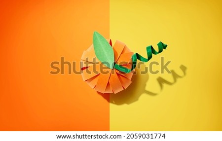 Paper craft autumn pumpkin overhead view - flat lay
