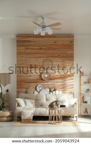 Living room interior with stylish decor and comfortable sofa