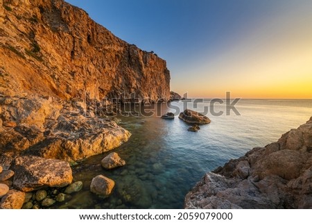 Sunrise on the cliffs of l'Estartit beach (Costa Brava)