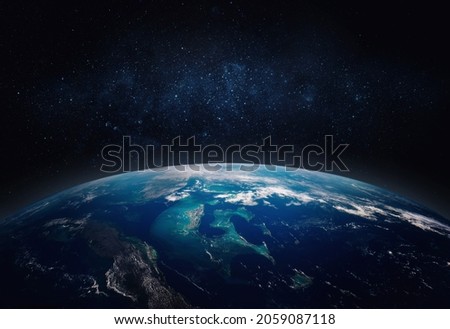  View of the Earth, star and galaxy. Sunrise over planet Earth, view from space. Concept on the theme of ecology, environment, Earth Day. Elements of this image furnished by NASA. Royalty-Free Stock Photo #2059087118