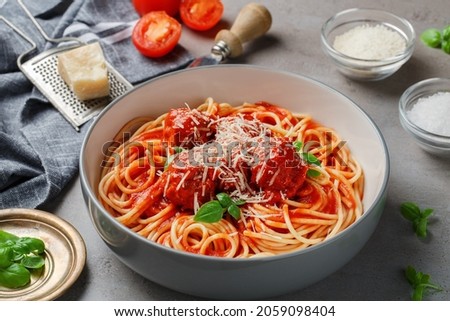 spaghetti pasta with meatballs and tomato sauce, basil, cheese Royalty-Free Stock Photo #2059098404