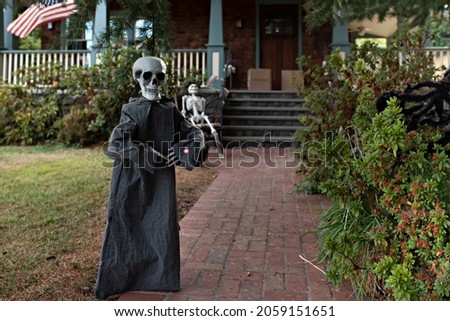 Skeletons Welcome the Trick or Treaters