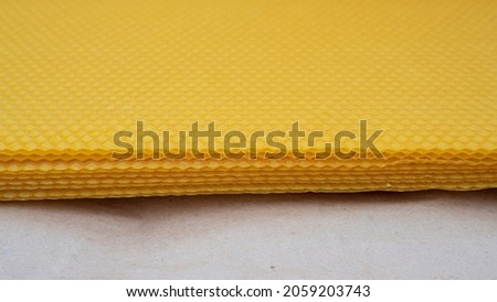 Beeswax for honeycomb on craft paper. Wax for bees.