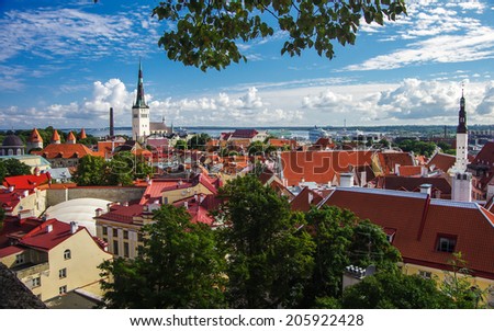 Red tiled roofs in historical part of Tallinn, Estonia in bright and clear summer day