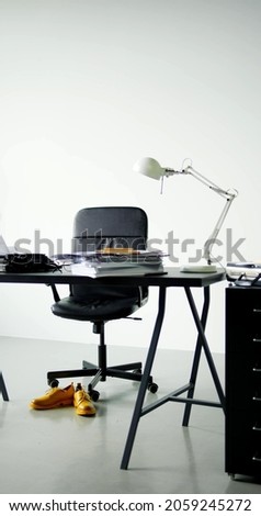 A vertical photo of a desk