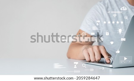 businessman Are working on the laptop keyboard to use the search engine optimization tool. To find customers or promote and advertise online content for technology, marketing, and business concept. Royalty-Free Stock Photo #2059284647