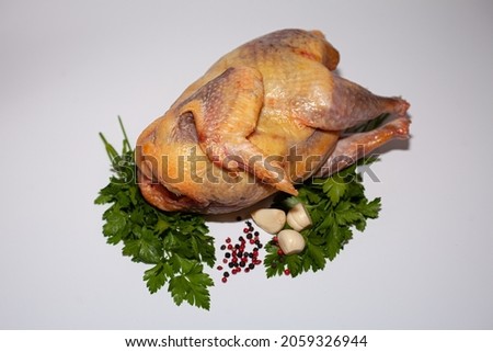 Guinea fowl meat with greens and spices. Organic delicious guinea fowl meat Royalty-Free Stock Photo #2059326944