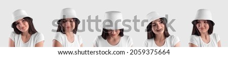 Mockup of white trendy panama on beautiful smiling dark-haired girl, isolated on background. Stylish headgear template for sun protection. Set of clothes, hats with brim. Summer, spring headwear Royalty-Free Stock Photo #2059375664