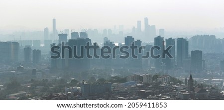 Large panoramic picture of Seoul with skyscrapers construction in the morning. Air pollution, bad ecologia over Seoul in South Korea.