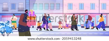 people with children walking at city street christmas new year holidays celebration concept winter cityscape