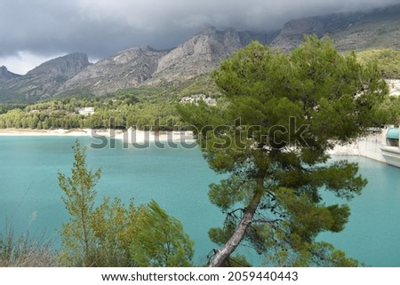 Panoramic photography of the Guadalest reservoir on a cloudy day