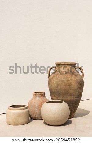 Vintage gardening clay pots in minimal style Royalty-Free Stock Photo #2059451852