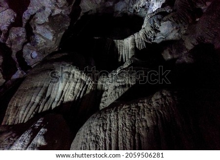 A low angle shot of the insides of a rocky cave