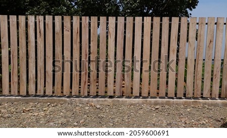 brown wooden fence isolated on the garden